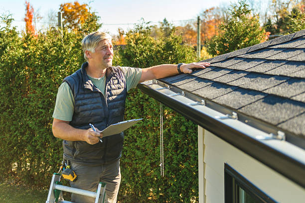 Professional Roofing technician working in Redlands, CA
